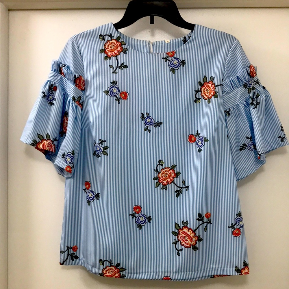 No brand noted size L ( also fits a M) stripe and floral blouse.